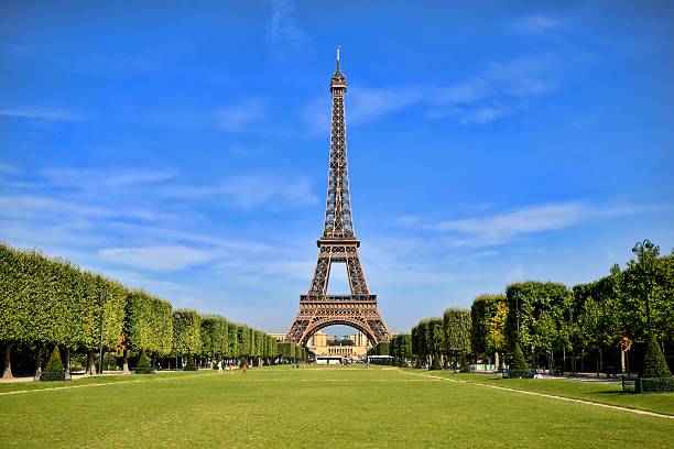 Eiffel Tower With Vibrant Blue Sky Stock Photo - Download Image Now - Eiffel Tower - Paris, Champ-de-Mars, France - iStock