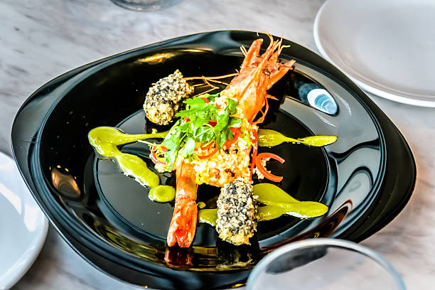 istock Tiger Prawn with Couscous, Coriander Sauce and Squid Croquette 512552752