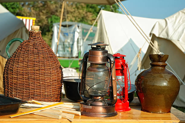 istock Kerosene lamps and crockery during the camping 512553138