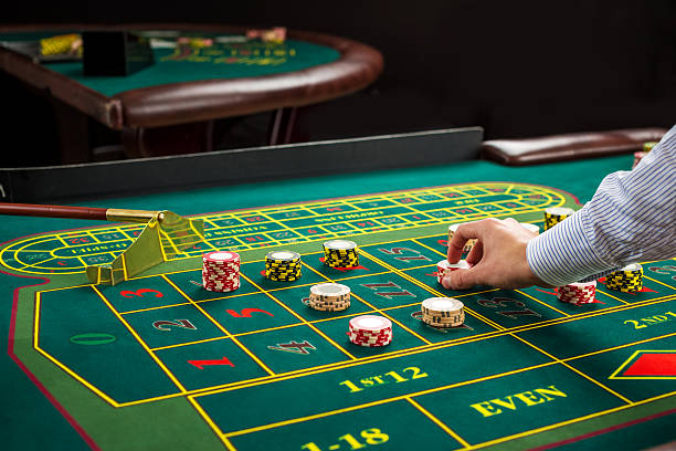 istock Picture of a green table and betting with chips. 512553684