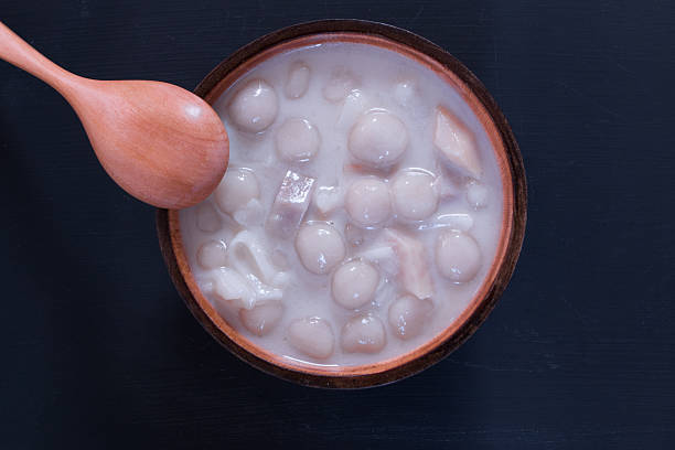 Bua Loy, Thai sweet dessert on black background stock photo