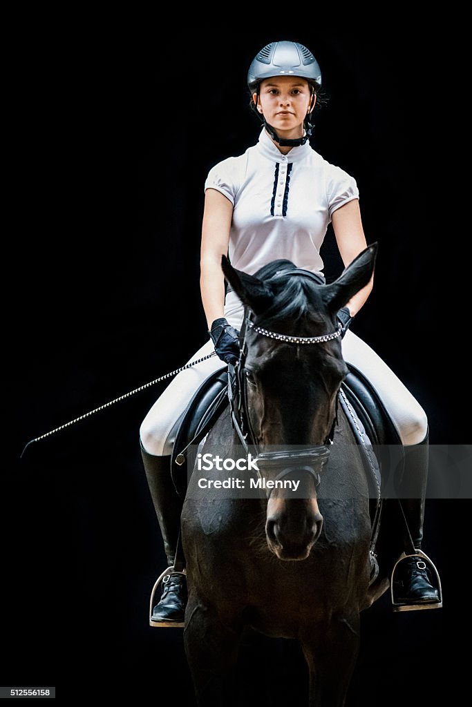 Teenage Girl Horseback Riding Equestrian Portrait Teenage girl in horseback riding outfit sitting on her beautiful horse. Horseback Riding Real People Portrait. Horse Stock Photo