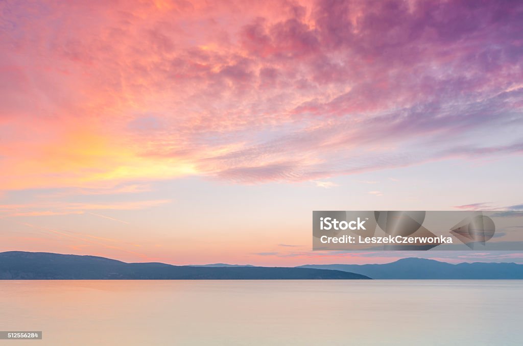 Beautiful sunset over the sea Beautiful sunset over the sea. Dalmatia, Croatia. Awe Stock Photo