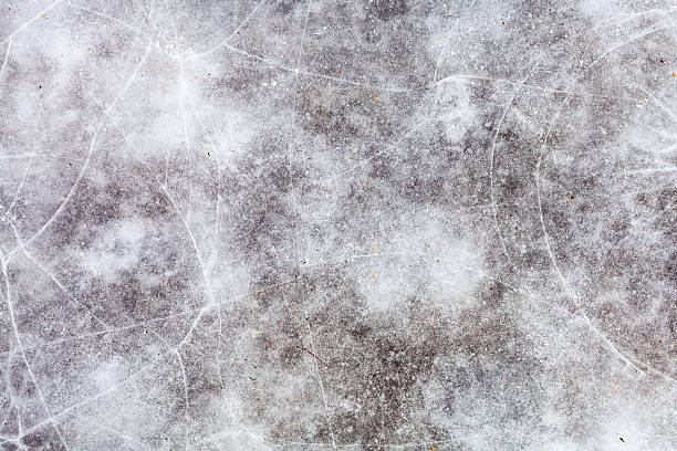 istock ice surface of frozen pond in winter 512569230