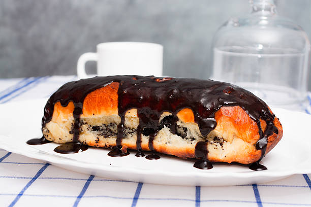 istock homemade baking. roll with poppy seeds. 512569650