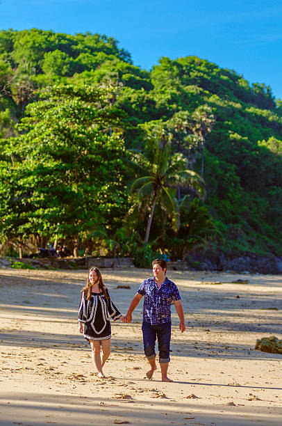 istock Honeymoon couple playing on a beach in Thailand 512569948