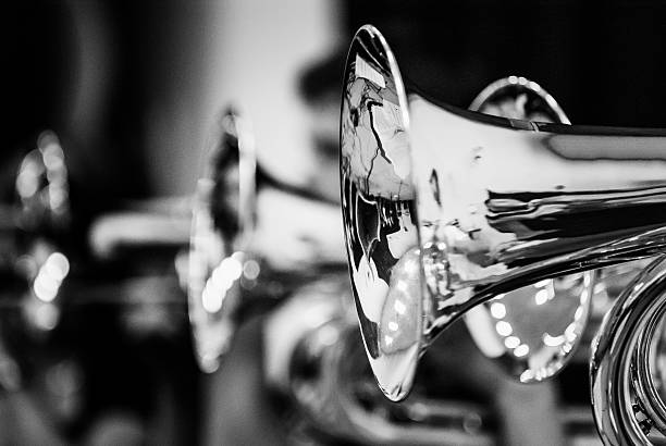 Various instruments and details from a music band of windband Close up and details of playing musicians, instruments in a marching, show band or music band brass instrument stock pictures, royalty-free photos & images