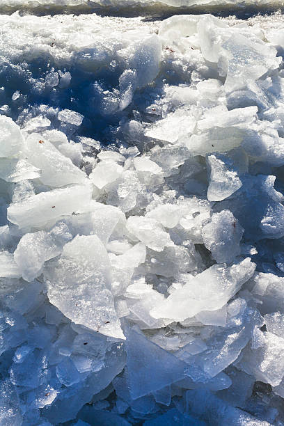 istock ice blocks near ice-hole in frozen river 512570516