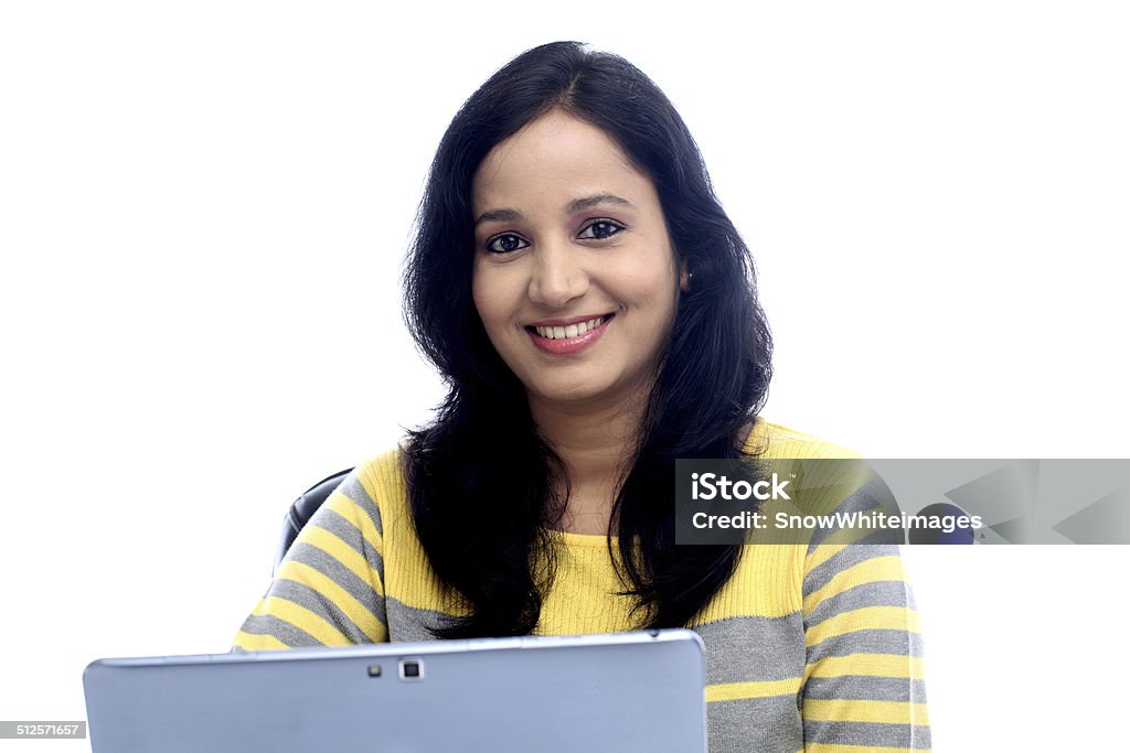 Young woman working with tablet computer Young woman working with tablet computer at home Adult Stock Photo