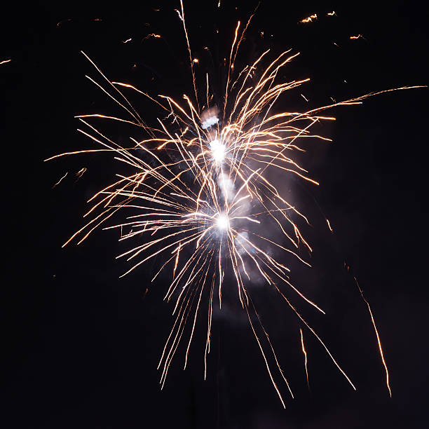 istock Cluster of colorful Fourth of July fireworks. 512573111