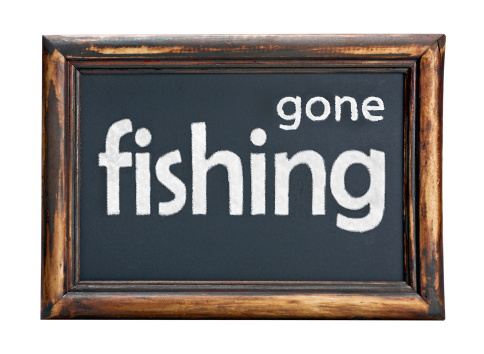 Black chalk board with the inscription gone fishing