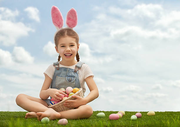 istock girl wearing bunny ears 512573368