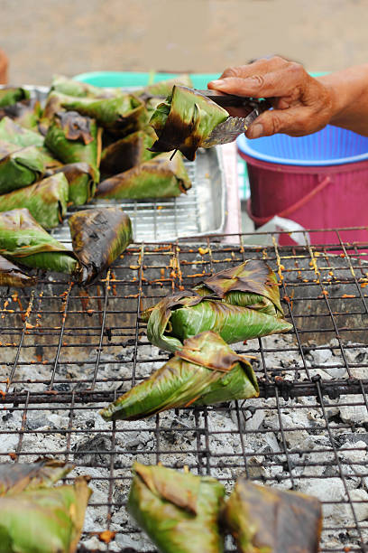 istock Sticky rice grilled asia food 512573409