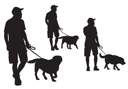 A man walking with a dog on a leash. Silhouette on a white background.