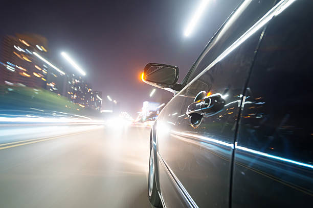 istock car on the road with motion blur background 512574571