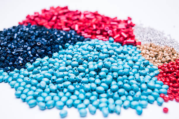 istock Blue colorful beads isolated on white background 512574572