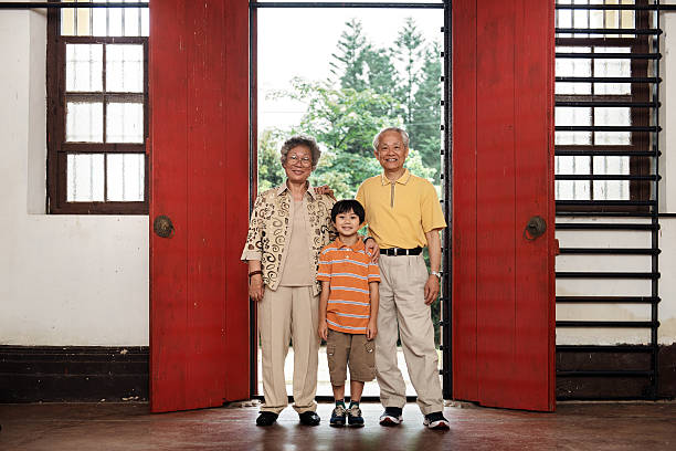 istock Grandparents and grandson portrait 512576957