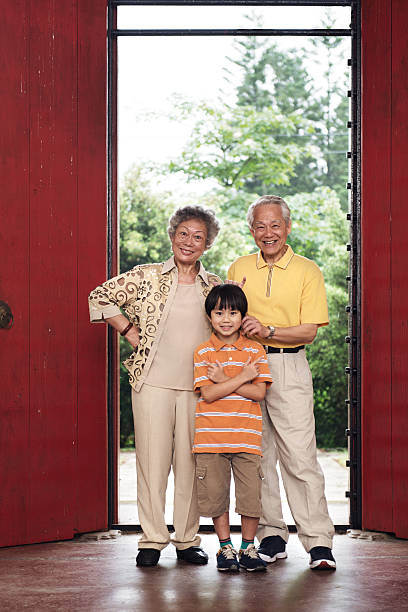 istock Grandparents and grandson portrait 512576959