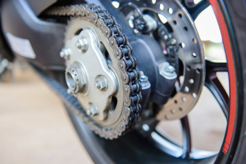 motorcycle wheel and drive-chain and brake,close up