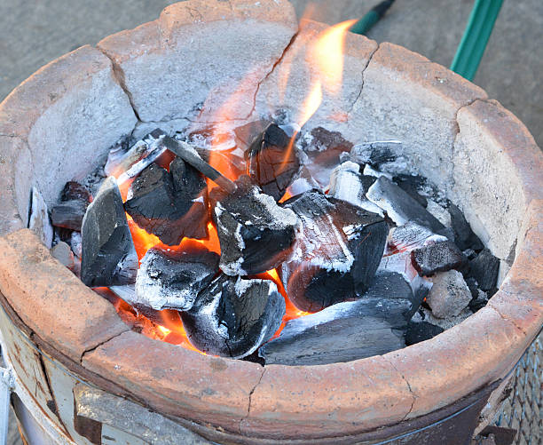 istock Focus on Cinders in stove Gill for make cook 512577415