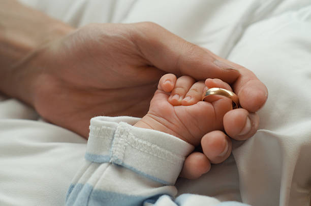 Baby Hand Rings 4,900+ Baby Rings Stock Photos, Pictures & Royalty-Free Images - iStock