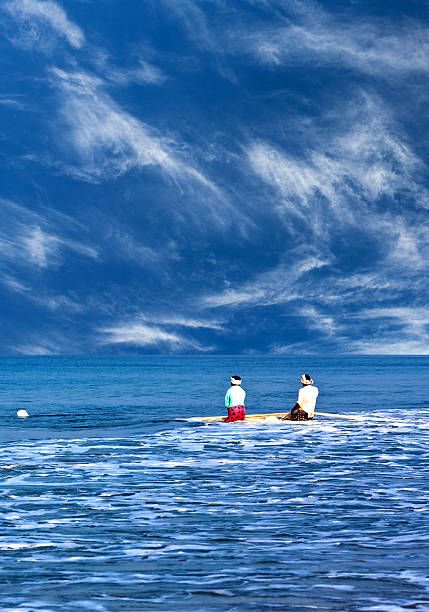 Indian fishermen in Kerala, South India Varkala, India - February 8, 2010: Indian fishermen catching fish for food in Kerala state, South India tamil nadu landscape stock pictures, royalty-free photos & images