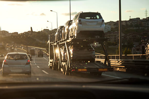 New cars transportation in traffic stock photo