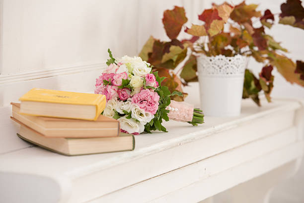 istock bridal bouquet from roses and books 512594372