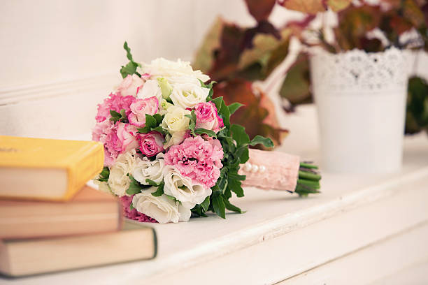 istock bridal bouquet from roses and books 512596204