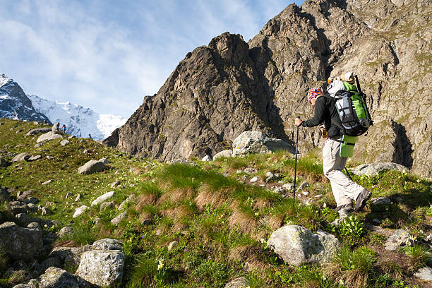 istock Hikier is climbing mountain in Caucasus mountains in Bezengi reg 512596630