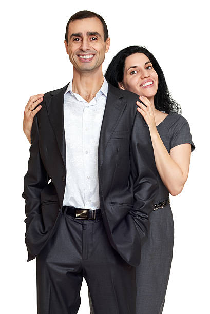 istock Happy couple dressed in classic clothes, portrait at studio 512599006