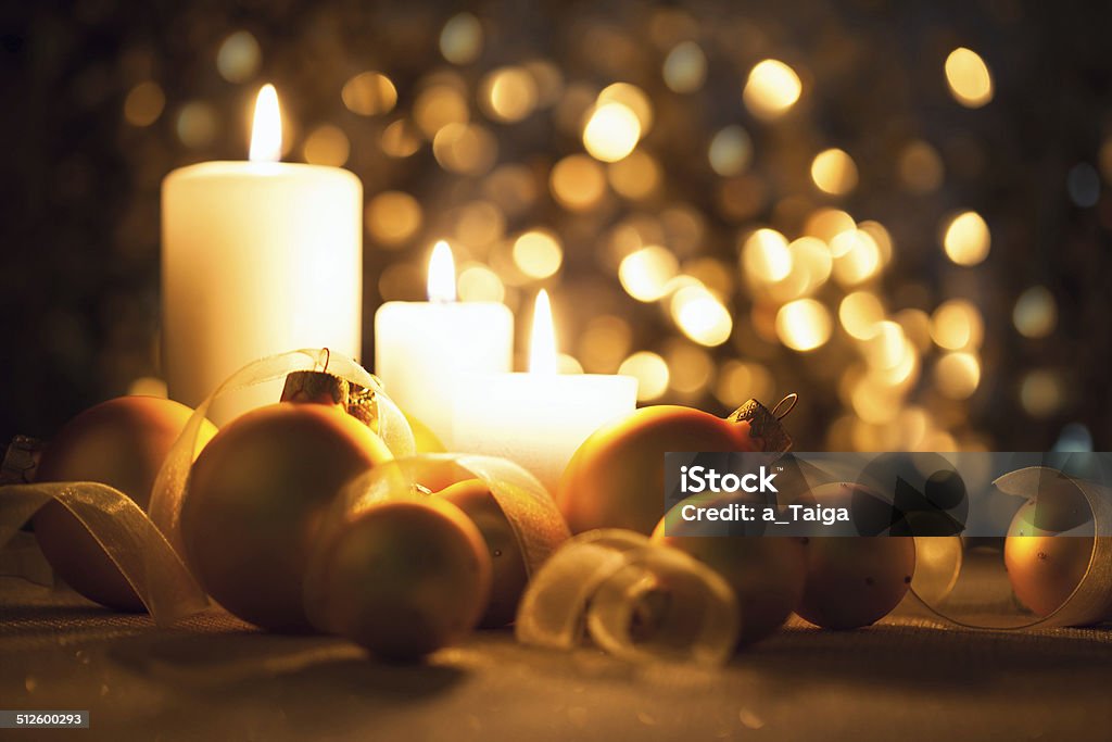 Warm Night Christmas decorations on magic bokeh background Warm Night Christmas decorations  with candles, baubles and ribbons on magic  bokeh background Backgrounds Stock Photo