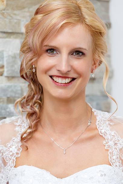 istock portrait of beautiful smiling bride 512600317