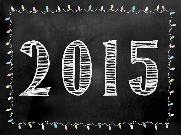 2015 New Year chalkboard sign in illustrative chalkboard style