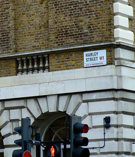 The Harley Street sign in the City of Westminster.  The famous street is known for its prestigious doctors' clinics and private specialists in medicine and surgery