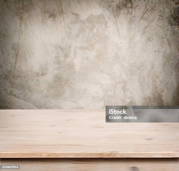 Wooden Table On Defocuced Vintage Wall Background Stock Photo - Download Image Now - Rustic, Kitchen, Backgrounds