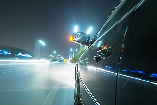 istock car on the road with motion blur background 512605695