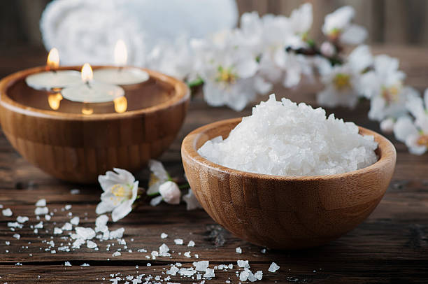 istock SPA treatment with salt, almond and candles 512618178
