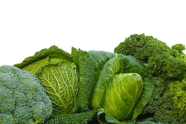 istock Fresh green organic market vegetables on white background 512619424