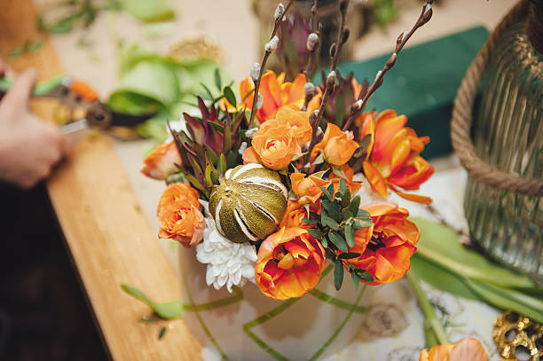 istock florist makes a box with different flowers 512620898