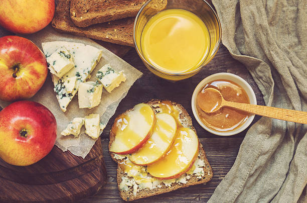 istock Breakfast toast with apple, honey and gorgonzola cheese 512621746