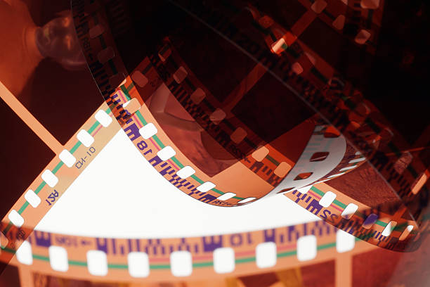istock Old negative 35mm film strip on white background 512622308