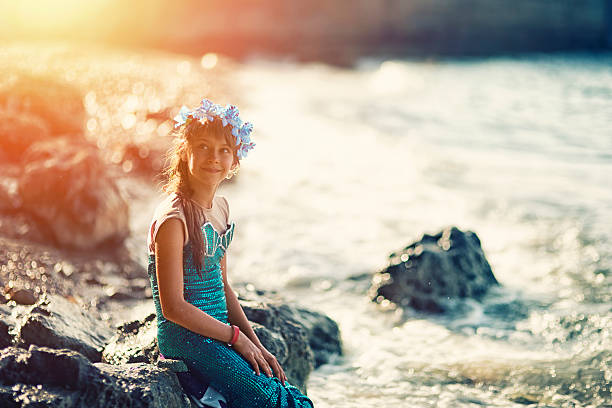 istock Little mermaid at the shore 512622790
