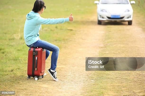 Woman Humb Up For A Ride Stock Photo - Download Image Now - Hooded Shirt, Only Women, Women