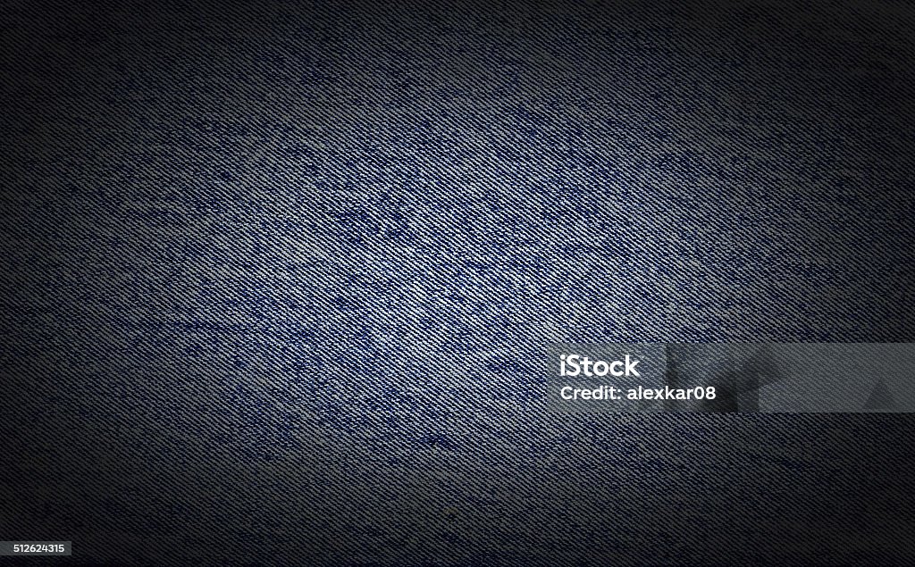 Used denim Used textured blue jeans denim fabric vintage background Abstract Stock Photo