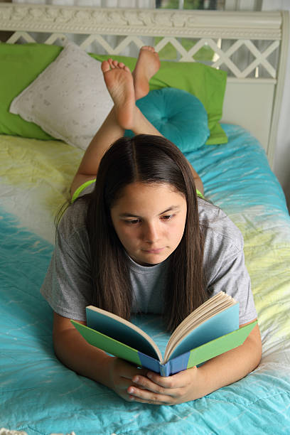 istock Teenager Reading 512624519