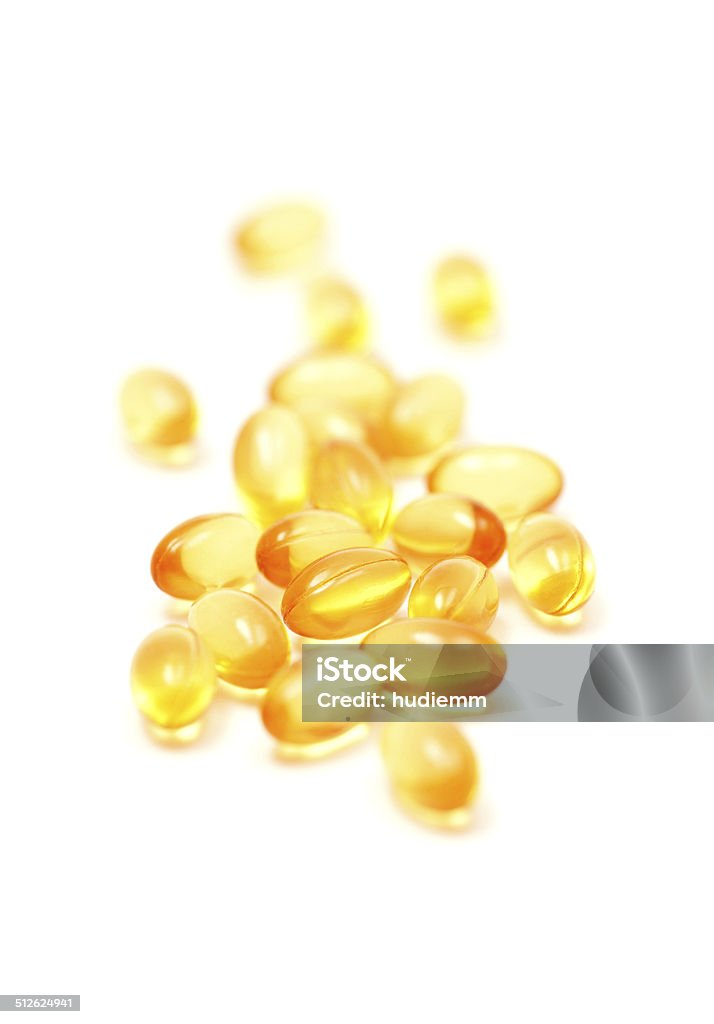 Fish oil capsules (medicine and health products) isolated on white Fish oil capsules (medicine and health products) isolated on white background Antioxidant Stock Photo