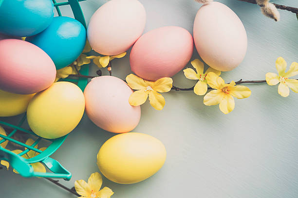 istock Easter arrangement with painted eggs, blossoms and pussy willow 512625452