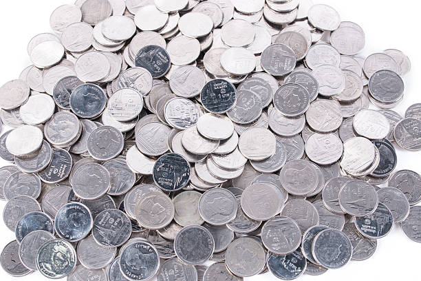 istock pile of one baht coins isolated one white 512627736