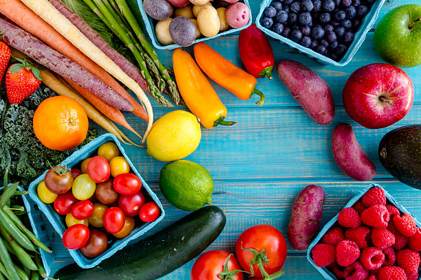 Assorted Fruits and Vegetables Background stock photo
